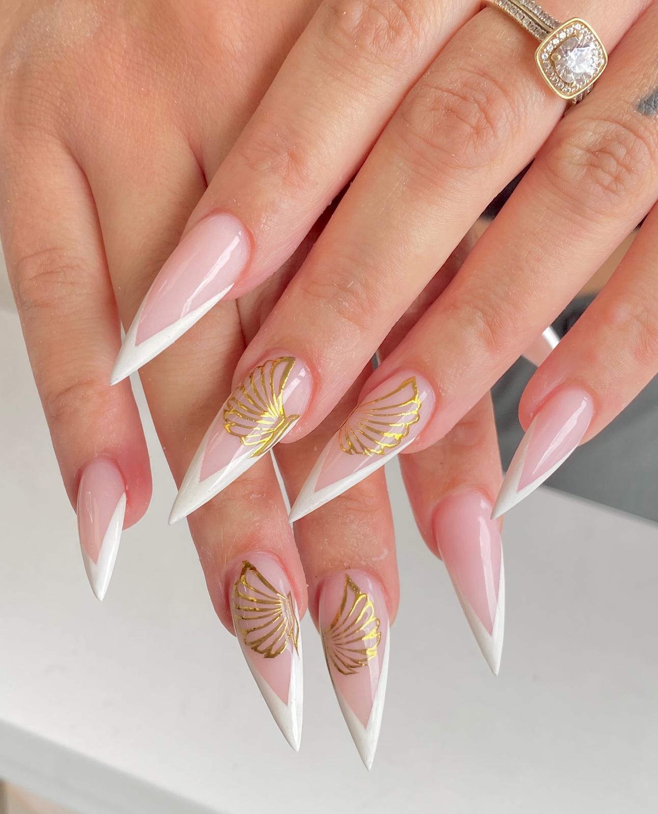 Minimalist nude nails with geometric line designs